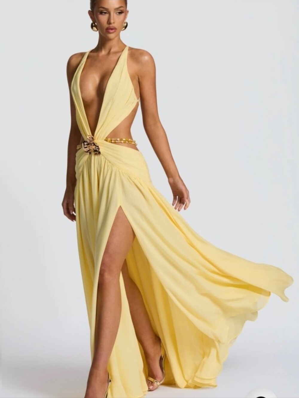 Elegant Yellow Halter Maxi Dress with Floral Waist Accent